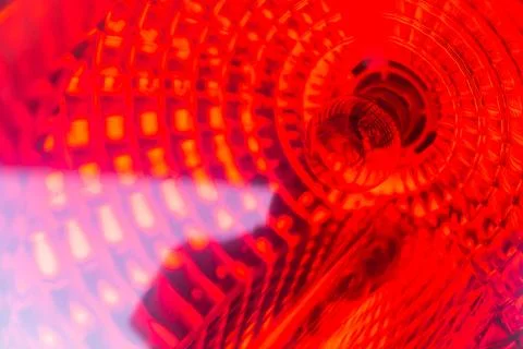 Red background and structure of a red warning lamp Stock Photos