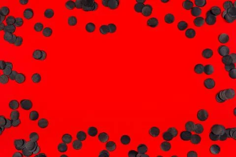 Red background with black confetty. Stock Illustration