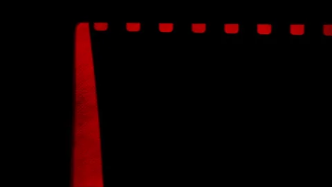 Red background with Film Frame Stock Footage 310538410