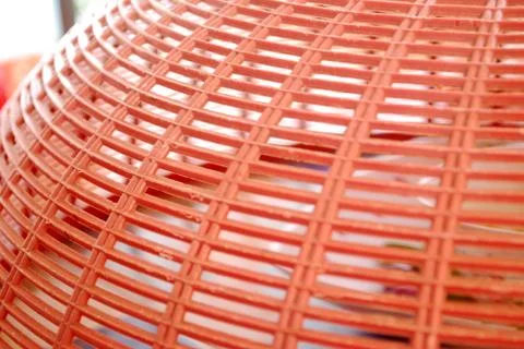 Red background with grille pattern. Foto stock