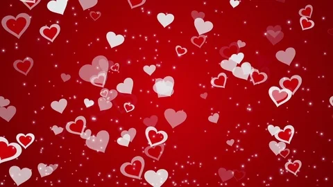 Red background with a hearts and glowing particles Stock Footage 84712930