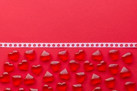 Red background with hearts pattern and copy space Stock Photos