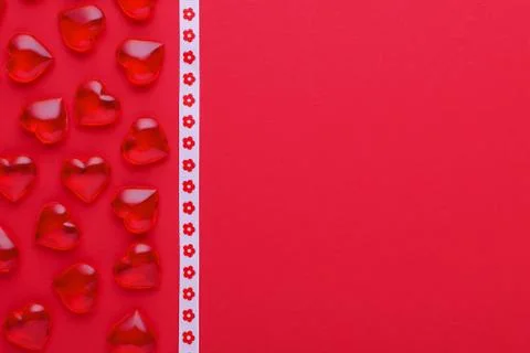 Red background with hearts pattern and copy space Stock Photos