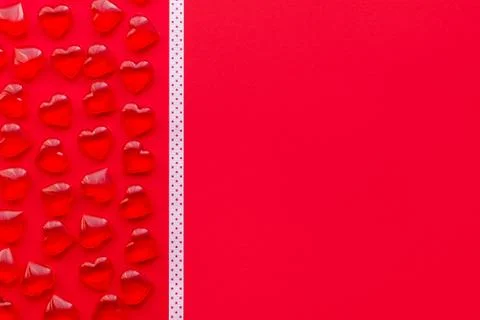 Red background with hearts pattern and copy space Stock Photos