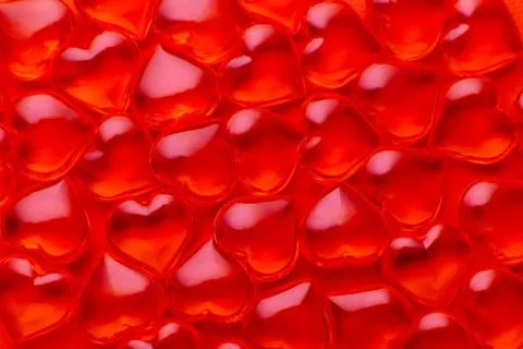 Red background with hearts pattern, flat lay, closeup Stock Photos