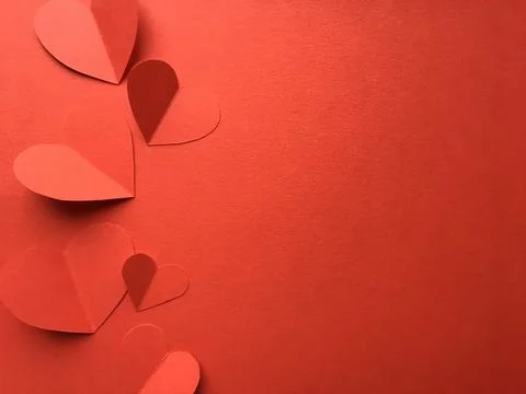 Red background with hearts Stock Photos