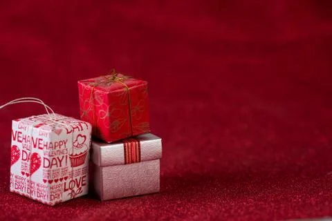 Red background image and gift box Valentine's Day concept Stock Photos