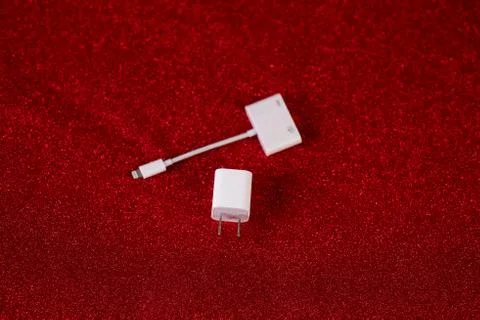 Red background image and USB computer plug device Technology concept Stock-Fotos