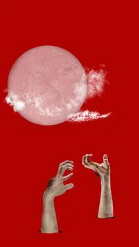 A red background with a large red full moon and two zombie hands raised fro.. Stock Photos