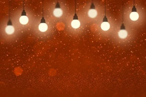 Red background light bulbs with sparks bokeh - celebratory texture Illustrazione stock