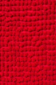 Red background from material close-up Stock Photos