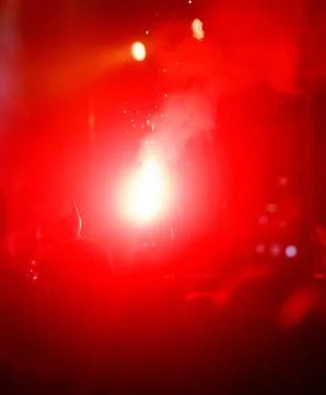 A red background with a red firework in the center 写真素材
