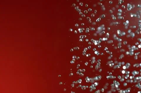 Red background water drops texture Stock Photos