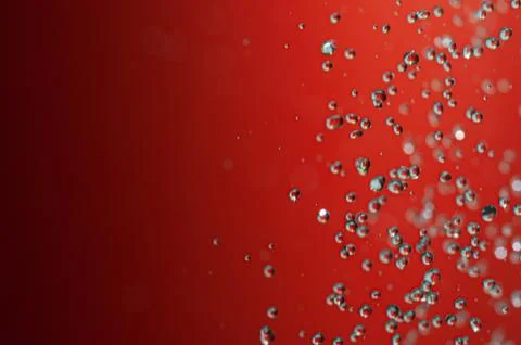 Red background water drops texture Stock Photos