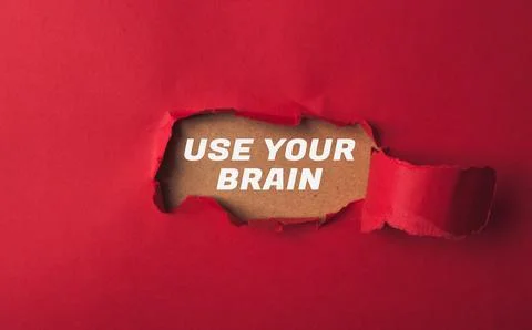 Red background with the words use your brain written in white Stock Photos