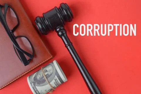 Red background written with text CORRUPTION. Top view. Stock Photos