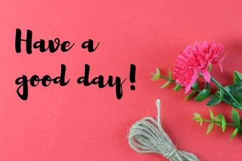 Red background written with text HAVE A GOOD DAY!. Inspirational quote. Stock Photos
