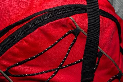 Red backpack with black zipper Stock Photos