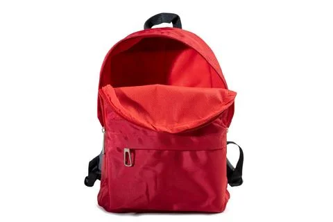 Red backpack open isolated over a white background. Copy space. Concept of .. Stock Photos
