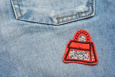 Red bag patch with rhinestones. 스톡 사진