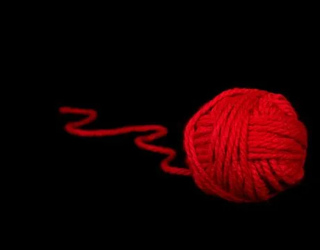 Red ball of yarn Stock Photos