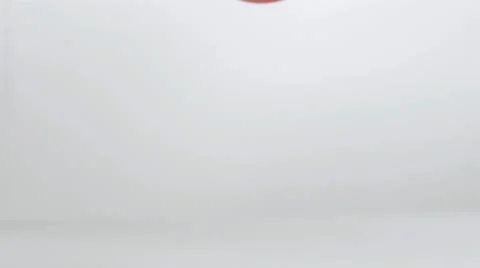 Red balloon falling in super slow motion Stock Footage 11698226