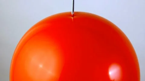 Red balloon popping Stock Footage 12091397