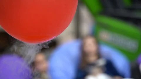 Red balloon, which is white smoke Stock Footage 105106473