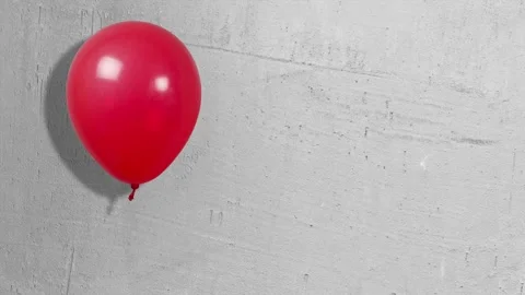 Red balloons on the background of the gray plastered walls Stock Footage 136678426