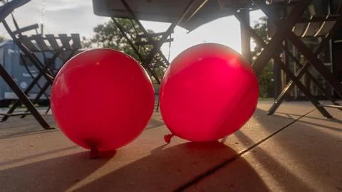 Red Balloons at Sunset Stock Photos