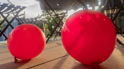 Red Balloons at Sunset Stock Photos
