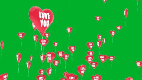 Red balloons ws heart shape flies on green chroma Stock Footage 101762148