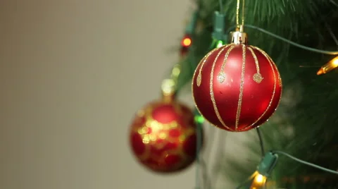 Red balls on a Christmas tree with blinking garlands Stock Footage 66358663