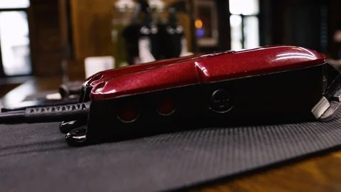 Red barber clipper. Stock Footage 104704387