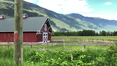 Red barn in the country Stock Footage 146988714