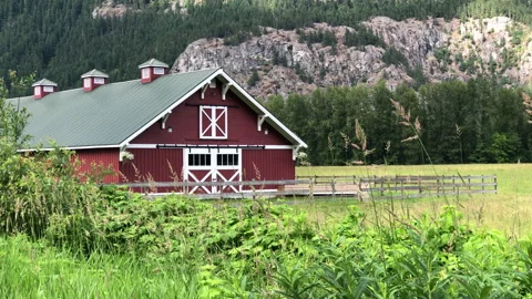 Red barn in the country Stock Footage 146988837