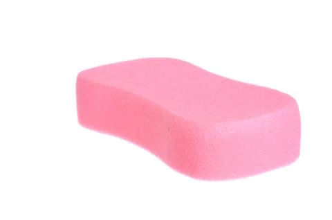 Red bathing sponge over white background Foto stock