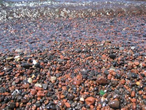 Red Beach Pebbles Close-up Stock Photos