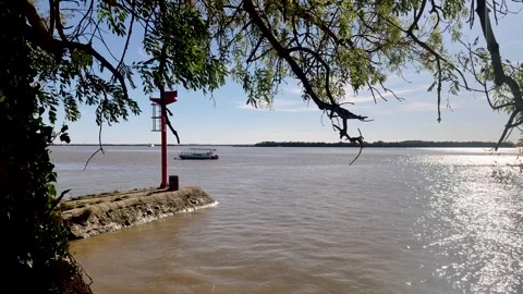 Red Beacon on a Stone Jetty Over the Gironde Estuary Video stock 348219288