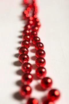 Red beads joined together Foto stock