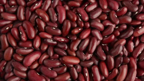 The red bean rotates. Raw beans. View from above. Stock Footage 288815210