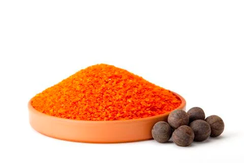 Red beans in a ceramic bowl with Black Persian Lemon on white background. food Stock Photos