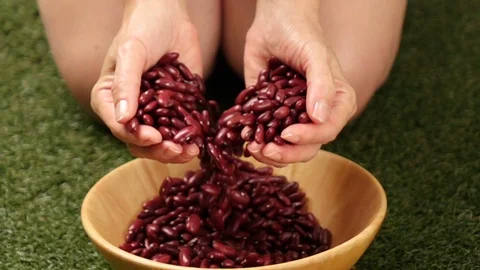 Red beans flow in slow motion Stock Footage 116657388