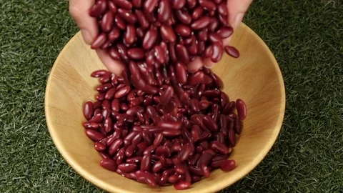 Red beans flow in slow motion Stock Footage 116657494