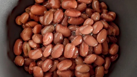 Red beans in sauce, rotating, turning, close-up Stock Footage 245519134