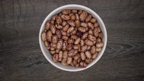 Red beans seen from above presented in a ceramic bowl Stock Footage 158614943