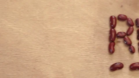 Red Beans On The Wooden Table Stock Footage 121465676