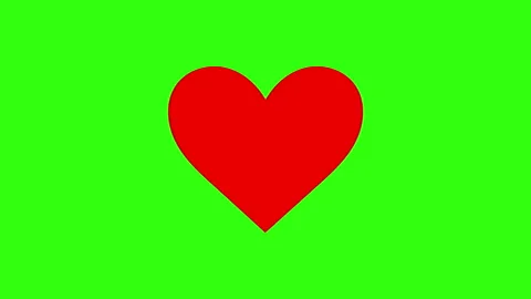 Red beating heart on black and green backgrounds, loopable animation Stock Footage 138146664