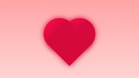 Red beating heart on a soft pink gradient background with copy space. Vídeos de archivo 335578371