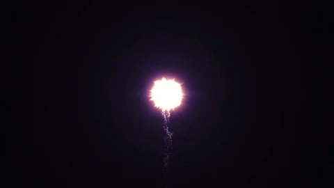 Red beautiful firework against black background Stock Footage 69974984